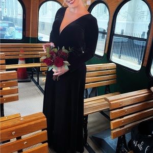 Elegant long sleeve black velvet gown w/ plunging v neckline nude mesh leg slit